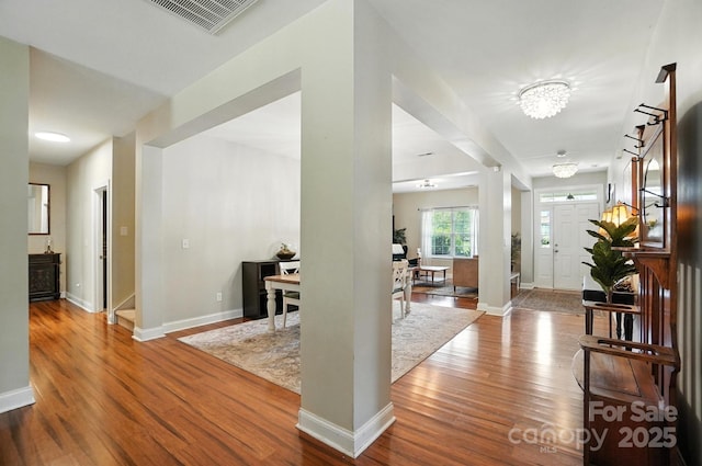 1006 Spring Rose Ln, Matthews, NC 28104 - entryway with wood finished floors and a chandelier
