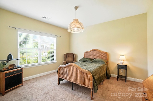 1006 Spring Rose Ln, Matthews, NC 28104 - carpeted bedroom featuring baseboards