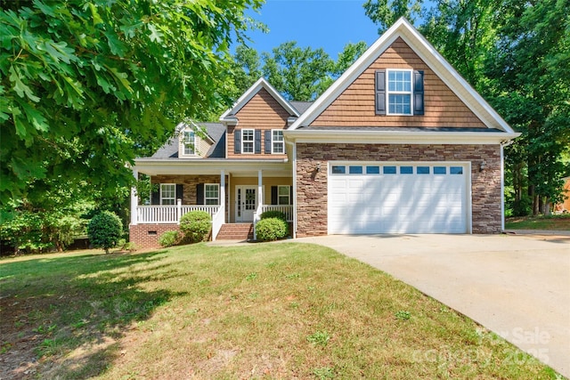 4203 Flint Dr, Lancaster, SC 29720 - view of front facade featuring covered porch, stone siding, a front yard, and driveway