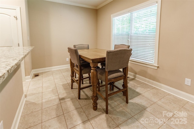 4203 Flint Dr, Lancaster, SC 29720 - dining space with crown molding, light tile patterned floors, and healthy amount of natural light