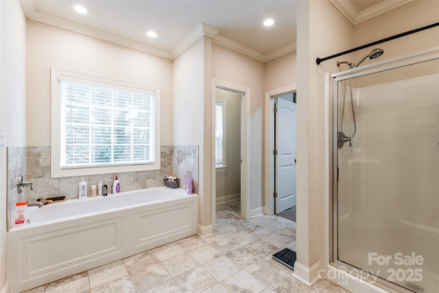 4203 Flint Dr, Lancaster, SC 29720 - bathroom featuring a stall shower, a bath, ornamental molding, and recessed lighting