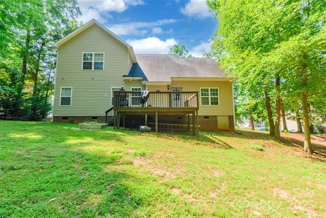 4203 Flint Dr, Lancaster, SC 29720 - rear view of house featuring crawl space, a wooden deck, a lawn, and roof with shingles