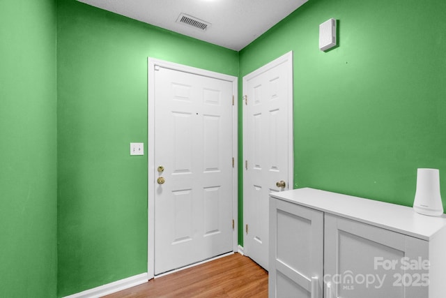 4614 Jacquelyne Dr, Indian Trail, NC 28079 - foyer entrance featuring wood finished floors and baseboards