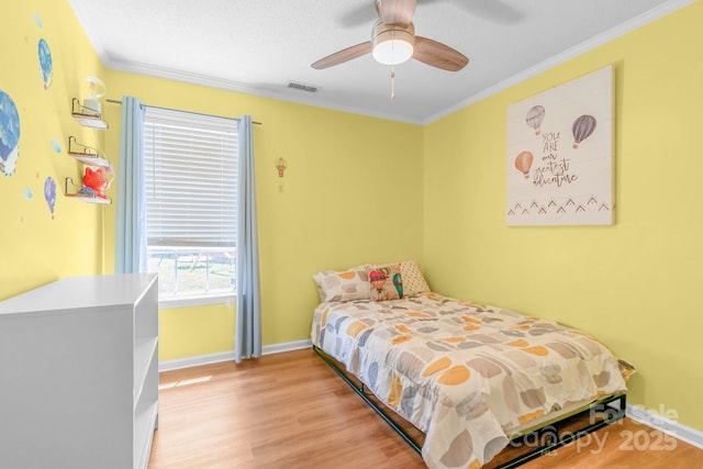 4614 Jacquelyne Dr, Indian Trail, NC 28079 - bedroom with ornamental molding, wood finished floors, and ceiling fan
