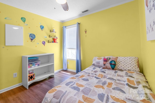4614 Jacquelyne Dr, Indian Trail, NC 28079 - bedroom with wood finished floors, ornamental molding, and ceiling fan