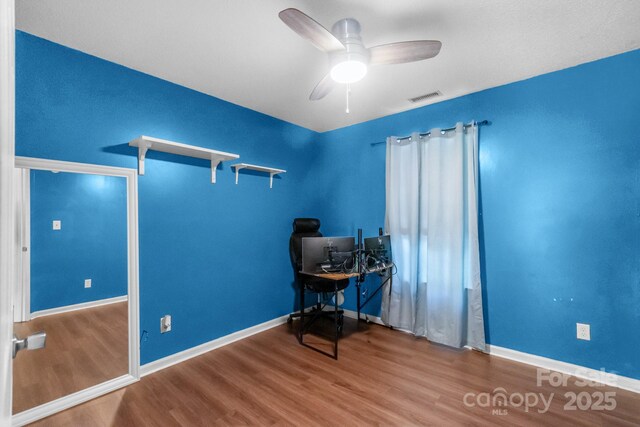 4614 Jacquelyne Dr, Indian Trail, NC 28079 - office area with wood finished floors and a ceiling fan