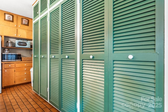 313 E Main St, Morganton, NC 28655 - detailed view of stainless steel microwave and white microwave