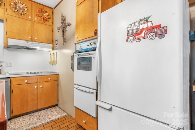 313 E Main St, Morganton, NC 28655 - kitchen with white appliances, under cabinet range hood, a warming drawer, light countertops, and brown cabinets