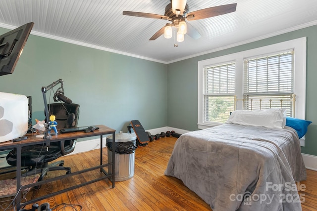 313 E Main St, Morganton, NC 28655 - bedroom with a desk, wood finished floors, ornamental molding, and a ceiling fan