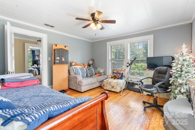 313 E Main St, Morganton, NC 28655 - bedroom with hardwood / wood-style floors, crown molding, and ceiling fan