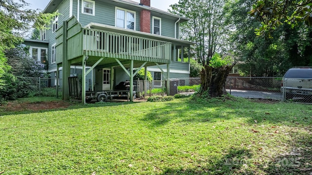 313 E Main St, Morganton, NC 28655 - rear view of property with a chimney, a fenced backyard, and a deck