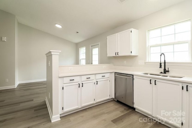 1628 Sandpiper Dr, Rock Hill, SC 29732 - kitchen with dishwasher, light wood finished floors, white cabinetry, light countertops, and lofted ceiling