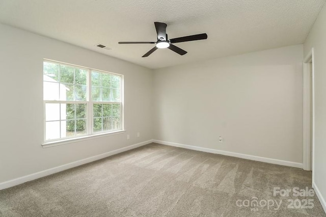 1628 Sandpiper Dr, Rock Hill, SC 29732 - spare room featuring carpet flooring, a ceiling fan, and a textured ceiling