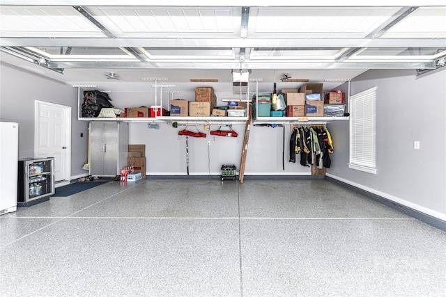 5129 Devonshire Rd, Denver, NC 28037 - garage featuring freestanding refrigerator and baseboards