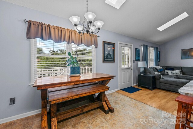 2906 Plantation Way, Albemarle, NC 28001 - dining area featuring a skylight, a chandelier, and vaulted ceiling