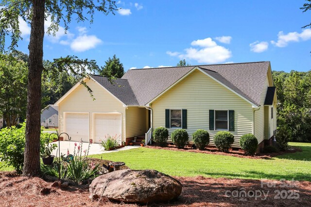 2906 Plantation Way, Albemarle, NC 28001 - view of front of house with a garage, concrete driveway, a front lawn, roof with shingles, and crawl space