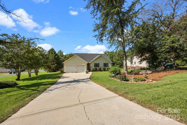 2906 Plantation Way, Albemarle, NC 28001 - view of front of home with a garage, driveway, and a front yard