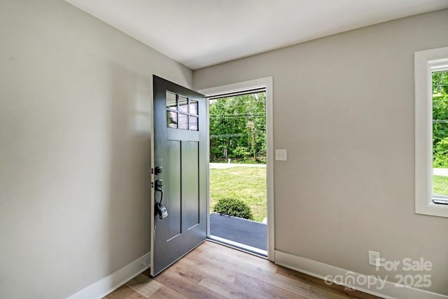 7724 E Holly Grove Rd, Thomasville, NC 27360 - entrance foyer featuring baseboards and light wood finished floors