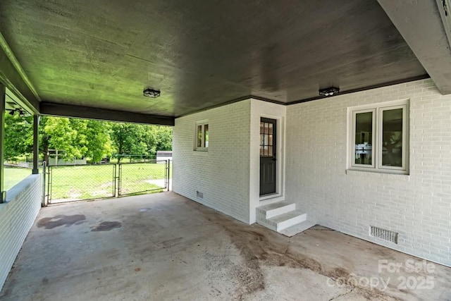 7724 E Holly Grove Rd, Thomasville, NC 27360 - view of patio / terrace with entry steps, a gate, and an attached carport