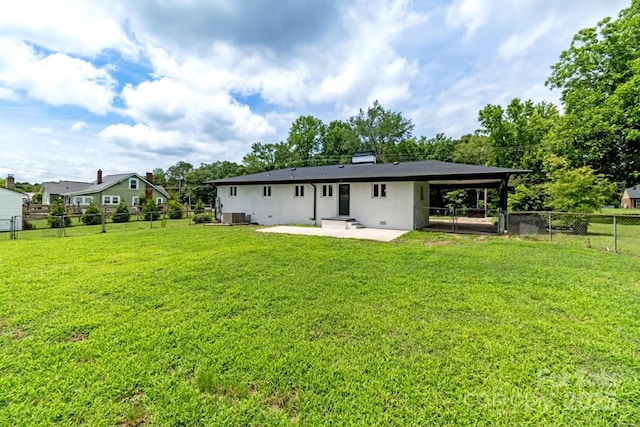 7724 E Holly Grove Rd, Thomasville, NC 27360 - rear view of property featuring a patio area, a fenced backyard, and an attached carport