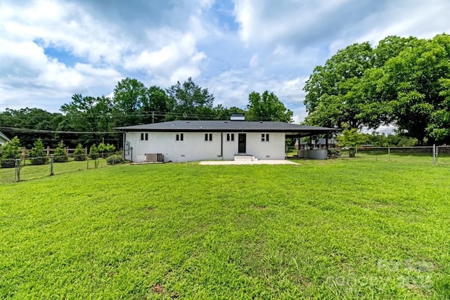 7724 E Holly Grove Rd, Thomasville, NC 27360 - rear view of house featuring a fenced backyard and a patio area