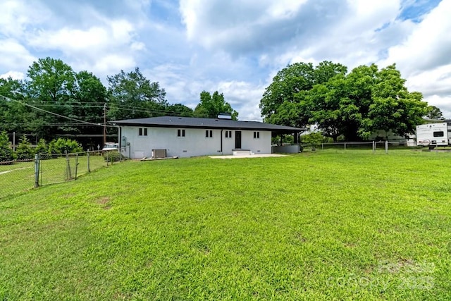 7724 E Holly Grove Rd, Thomasville, NC 27360 - back of property with a fenced backyard and a patio
