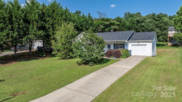 1265 39th Street Cir, Hickory, NC 28602 - view of front of house with a garage, a front lawn, concrete driveway, and roof with shingles
