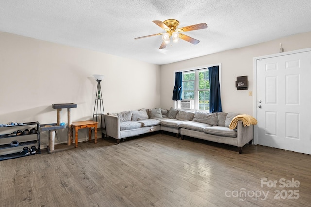 1265 39th Street Cir, Hickory, NC 28602 - living room featuring ceiling fan, wood finished floors, and a textured ceiling