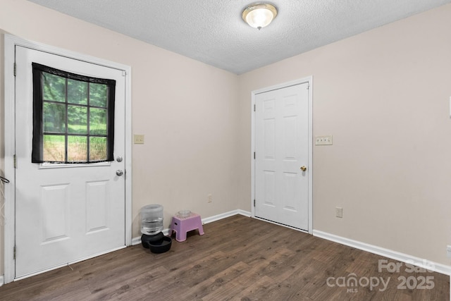 1265 39th Street Cir, Hickory, NC 28602 - doorway to outside with dark wood-type flooring and a textured ceiling