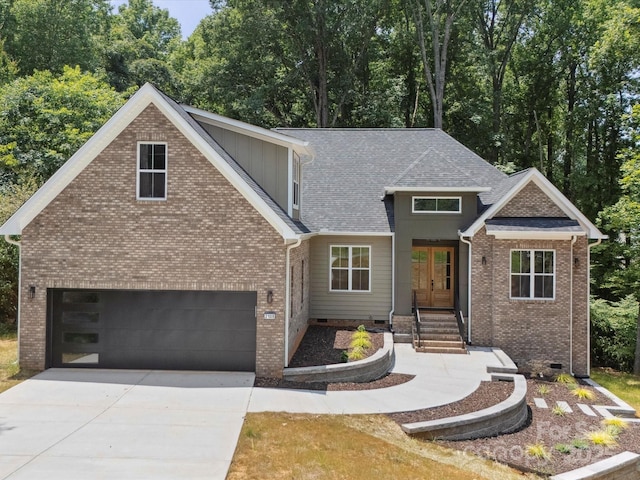 2108 Lakeview Cir, Matthews, NC 28105 - craftsman house featuring french doors, concrete driveway, brick siding, and crawl space