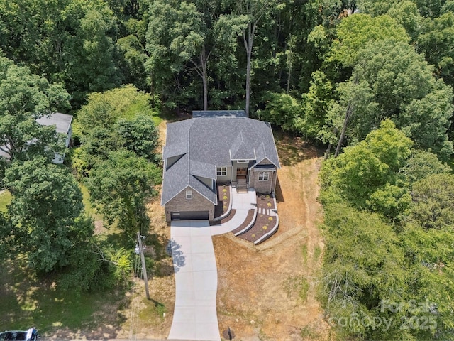 2108 Lakeview Cir, Matthews, NC 28105 - view from above of property featuring a heavily wooded area