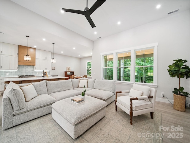 2108 Lakeview Cir, Matthews, NC 28105 - living room with recessed lighting, a ceiling fan, and light wood-style floors