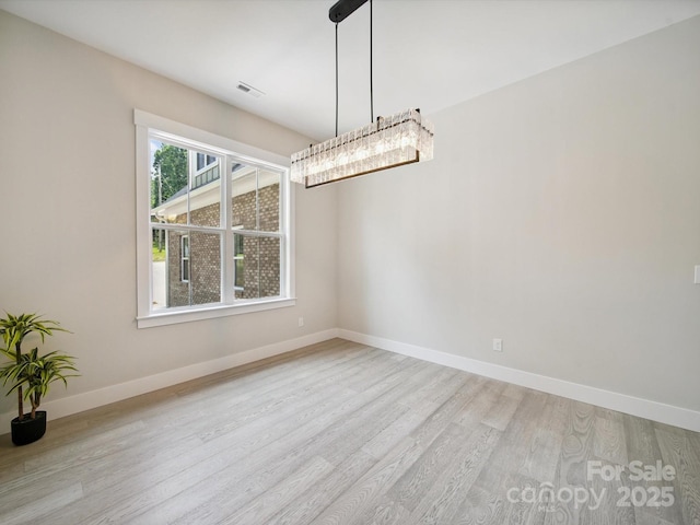 2108 Lakeview Cir, Matthews, NC 28105 - empty room with wood finished floors and baseboards