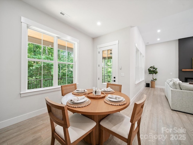 2108 Lakeview Cir, Matthews, NC 28105 - dining space featuring light wood-style flooring, healthy amount of natural light, and recessed lighting
