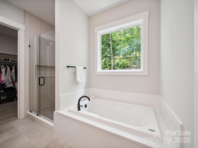 2108 Lakeview Cir, Matthews, NC 28105 - full bath featuring a bath, a shower stall, and a spacious closet