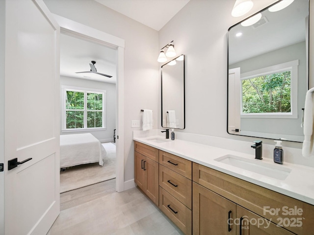 2108 Lakeview Cir, Matthews, NC 28105 - bathroom with double vanity, ensuite bath, and a ceiling fan