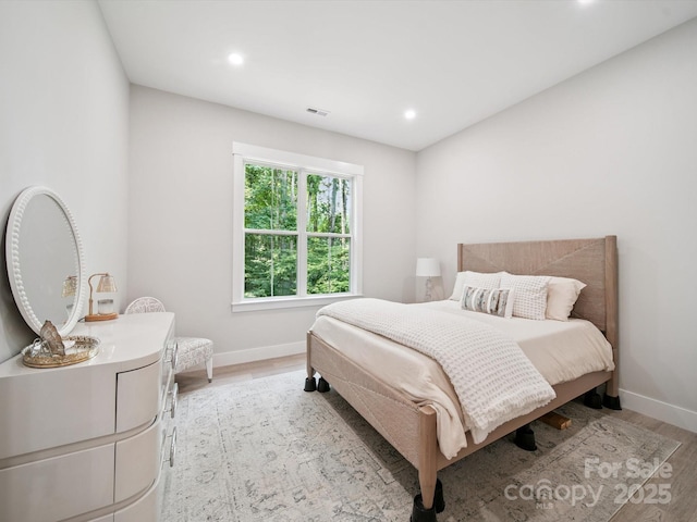 2108 Lakeview Cir, Matthews, NC 28105 - bedroom featuring wood finished floors and recessed lighting