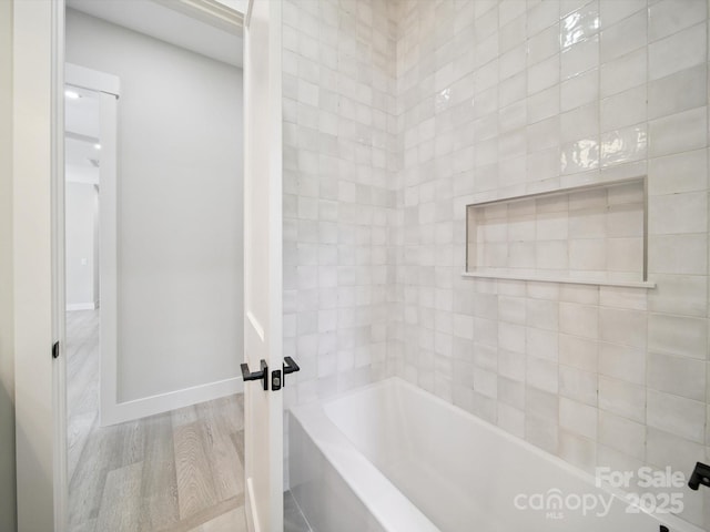 2108 Lakeview Cir, Matthews, NC 28105 - full bath with a tub and wood finished floors