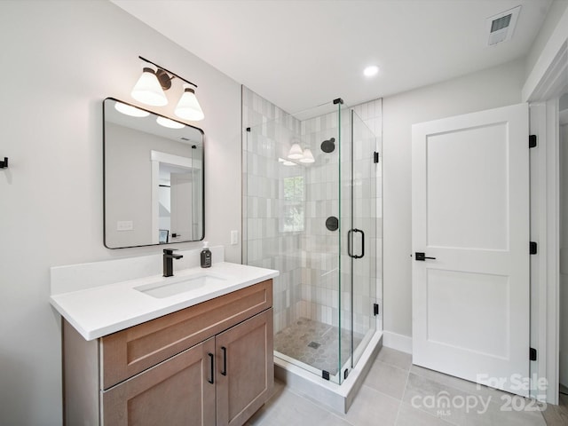 2108 Lakeview Cir, Matthews, NC 28105 - full bath featuring vanity, a shower stall, tile patterned flooring, and recessed lighting