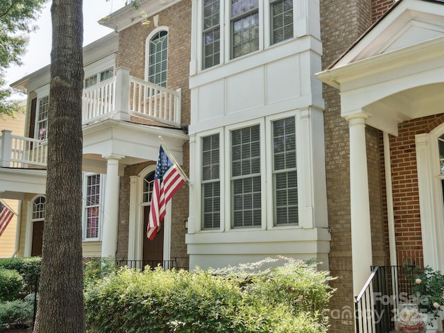570 Sixth Baxter Xing Unit 16, Fort Mill, SC 29708 - view of side of property featuring a balcony and brick siding