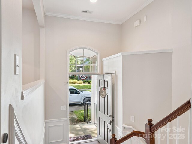570 Sixth Baxter Xing Unit 16, Fort Mill, SC 29708 - foyer entrance featuring crown molding, wainscoting, and stairs