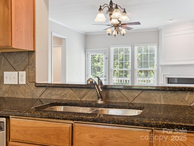 570 Sixth Baxter Xing Unit 16, Fort Mill, SC 29708 - kitchen with dark stone countertops, tasteful backsplash, ornamental molding, and ceiling fan