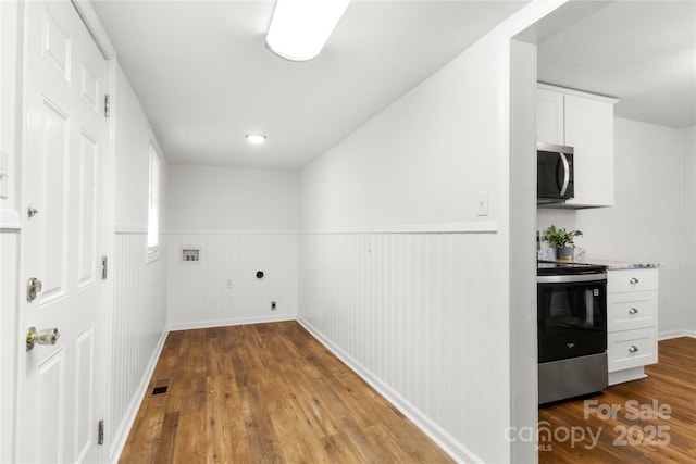 2488 Catawba Church Rd, Rock Hill, SC 29730 - laundry room featuring wainscoting and wood finished floors