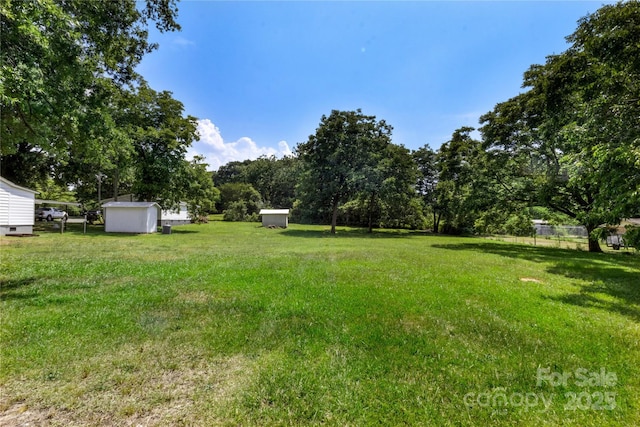 2488 Catawba Church Rd, Rock Hill, SC 29730 - view of green lawn featuring a storage shed