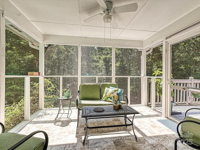 14019 Fountain Ln, Charlotte, NC 28278 - sunroom featuring a ceiling fan and outdoor lounge area
