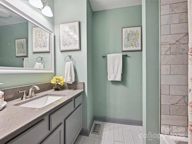 14019 Fountain Ln, Charlotte, NC 28278 - full bath featuring vanity and baseboards