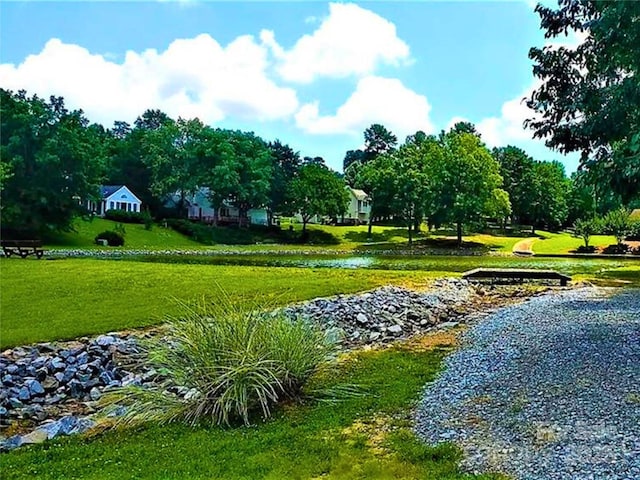 3616 Fair Oaks Pl NW, Concord, NC 28027 - view of home's community with a lawn
