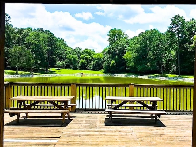 3616 Fair Oaks Pl NW, Concord, NC 28027 - deck featuring a water view and view of scattered trees