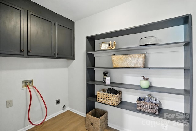 7109 Forney Hill Rd, Denver, NC 28037 - laundry room featuring cabinet space, wood finished floors, washer hookup, and electric dryer hookup