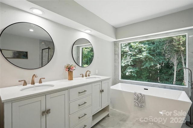 7109 Forney Hill Rd, Denver, NC 28037 - full bath featuring double vanity, a soaking tub, and recessed lighting